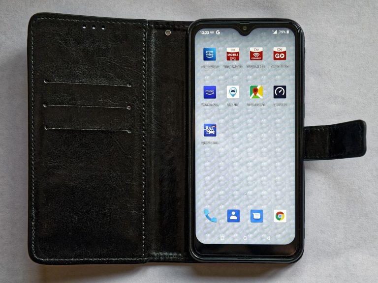 A smartphone in hand showing a wallet app